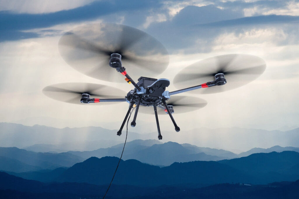 Aerial view of drone flying over cityscape - illustrating the impact of drone technology on urban landscapes.