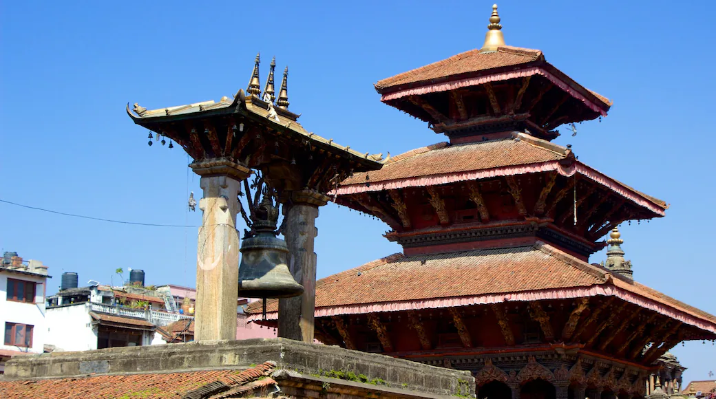 Intricate wood carvings on a traditional Newari building in Patan.