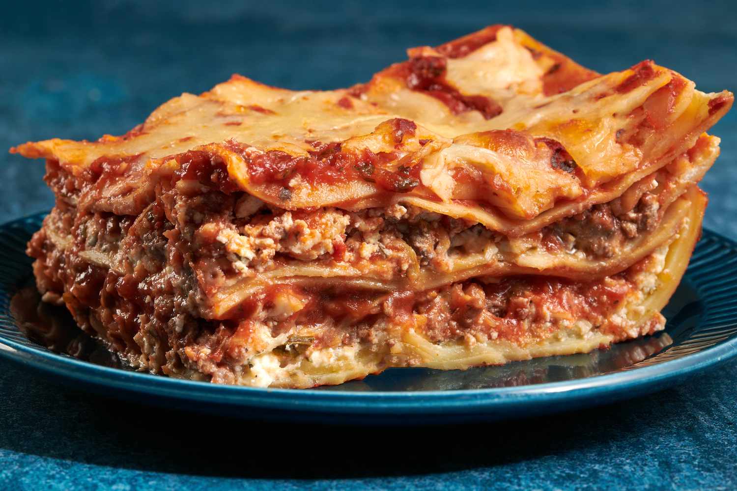 Traditional Italian lasagna layered with rich meat sauce and pasta. 